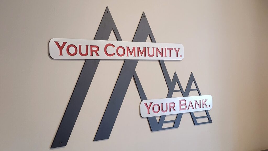 Your Community, Your Bank metal wall sign