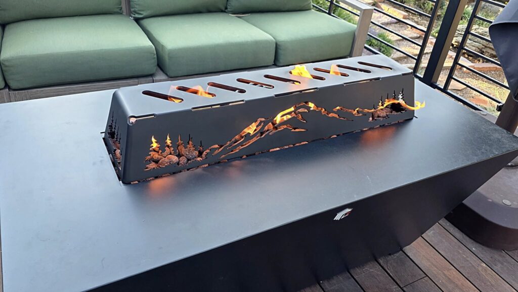 Custom fire pit table with flame cutouts