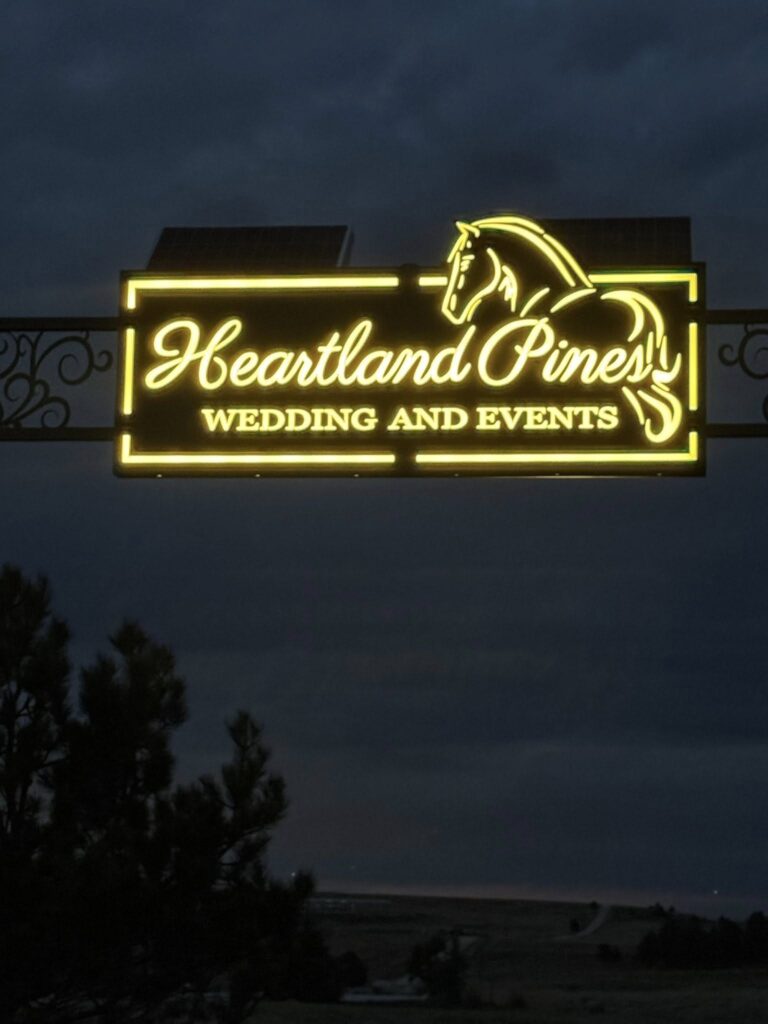 Illuminated Heartland Pines Wedding and Events sign