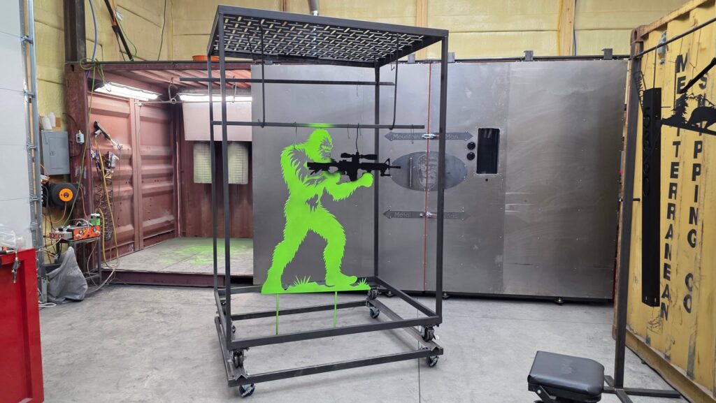 Lime green and black powder-coated Sasquatch metal artwork